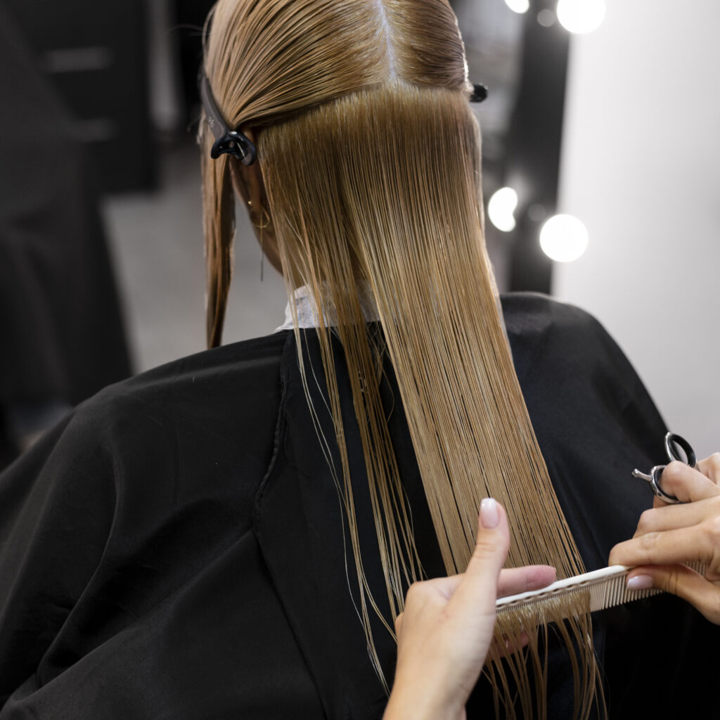 woman-getting-her-hair-cut-beauty-salon
